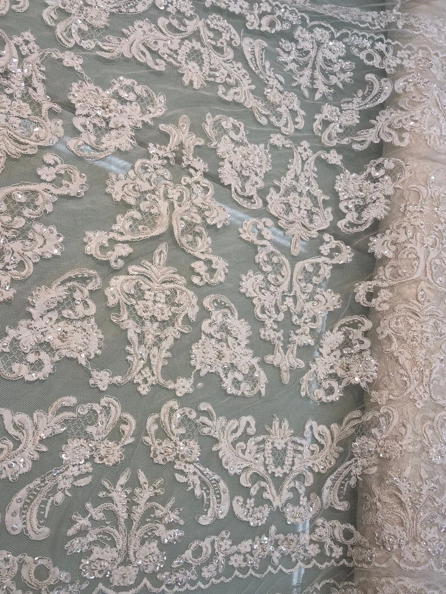 Hand beaded re-embroided bridal lace, 52” wide