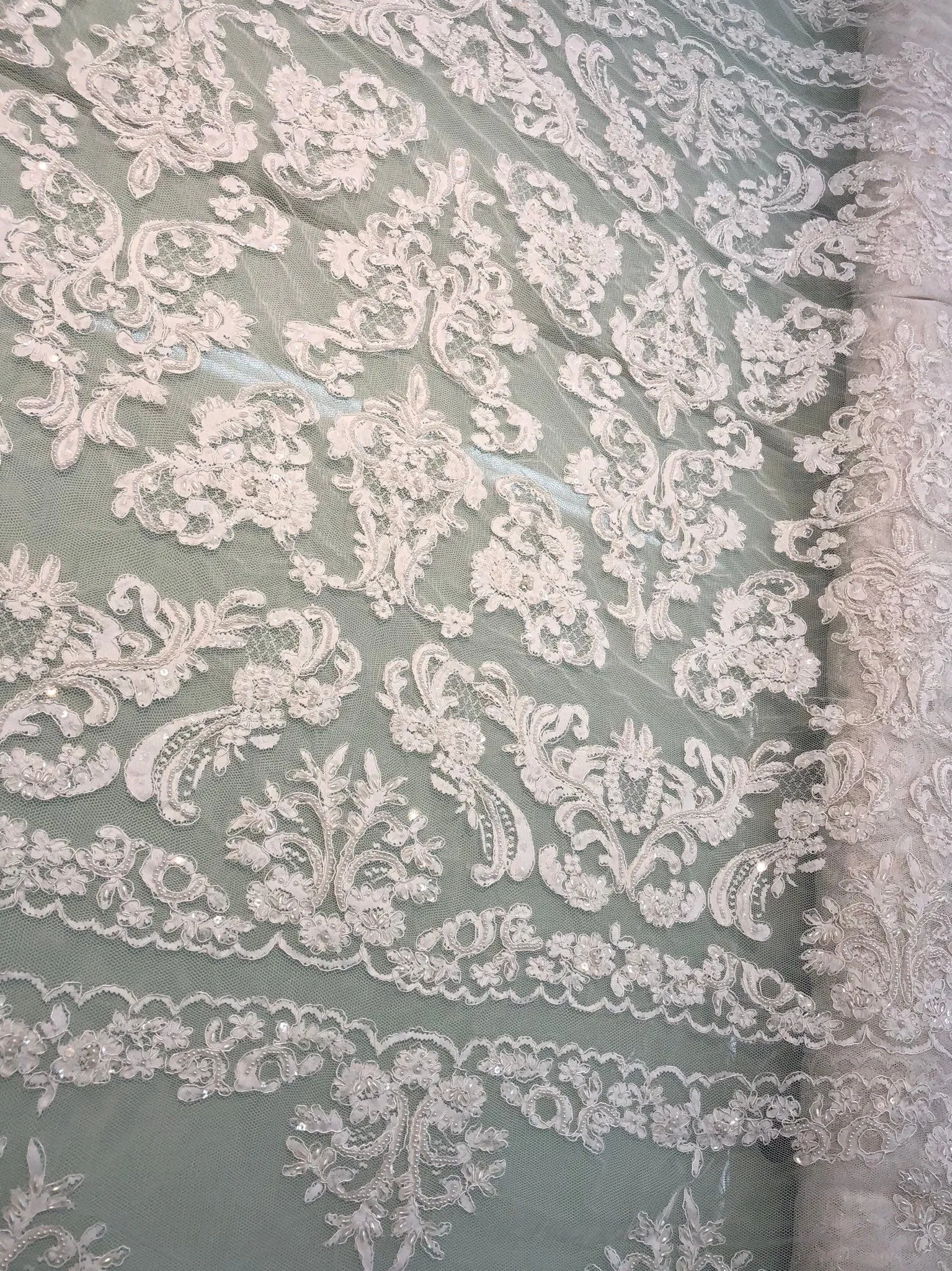 Hand beaded re-embroided bridal lace, 52” wide