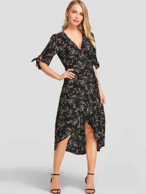 Wholesale Black Deep V Neck Half Sleeve Floral Print Self-Tie Wrap Irregular Hem Dresses